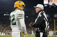 NFL referee talking to Aaron Rodgers - Tennessee Titans v Green Bay Packers